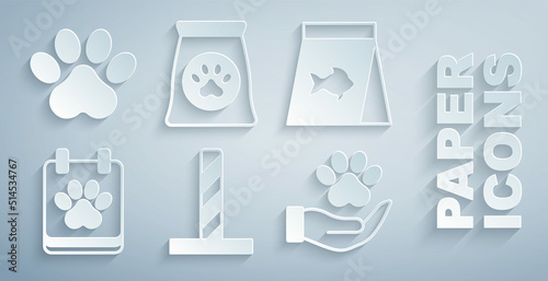 Set Cat scratching post with toy, Food for fish, Calendar grooming, Hands animals footprint, Bag of food pet and Paw icon. Vector