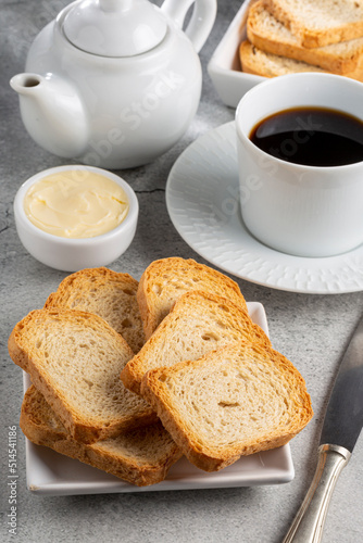 Healthy wholemeal toast with butter and coffee.