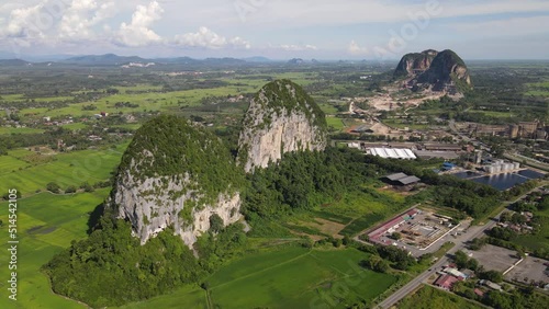 The Limestone Keteri Hill and The Surrounding Rice Paddy Fields photo