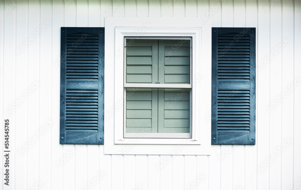 Elements of the facade of the house. window and shutters. Line minimalism.