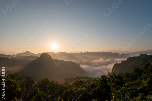 Top view of beautiful mountain range landscape with sunshine during sunrise time in Thailand.