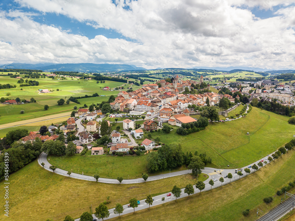 Fototapeta premium Aerial image of old Swiss town Romont, built on a rock prominence, in Canton Freibourg, Switzerland