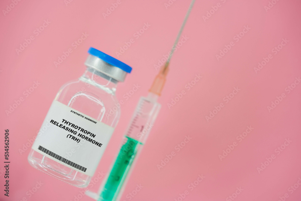 Thyrotropin releasing hormone (TRH). Test tube with artificial hormone on pink background Thyrotropin releasing hormone (TRH) Thyrotropin releasing hormone (TRH). Test tube with artificial hormone on pink background Thyrotropin releasing hormone (TRH)