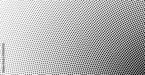 The halftone texture is black and white. Monochrome abstract  chaotic texture. Waves of dots on a white background  abstract halftone