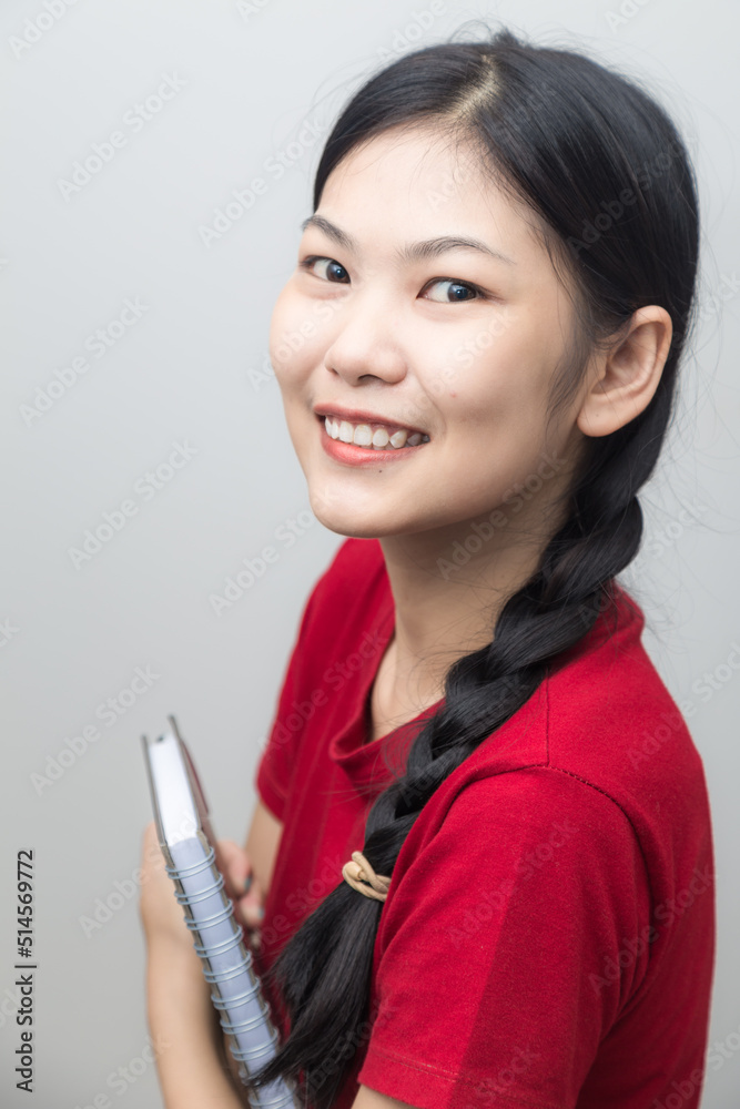 Smiling asian women casual red shirt on white background Smiling asian women casual red shirt on white background