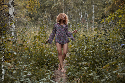 Semi-nude woman in the woods
