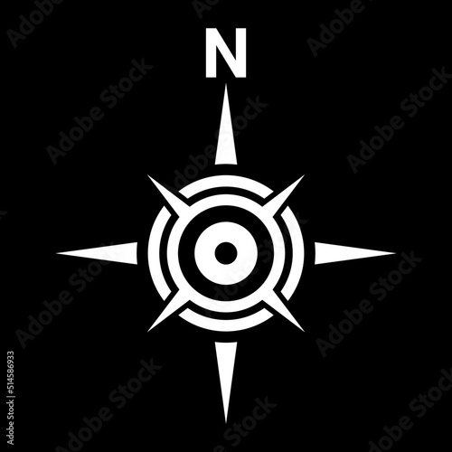  White north symbol on black background.