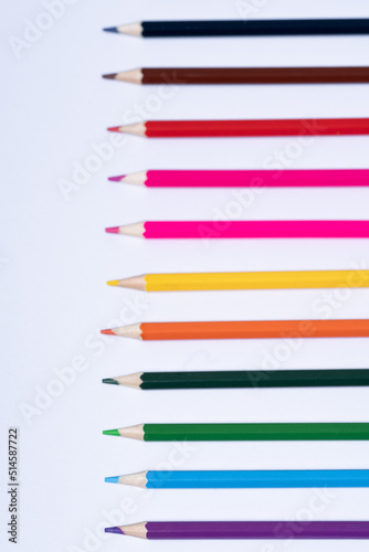 Multicolor colored pencils on a white background