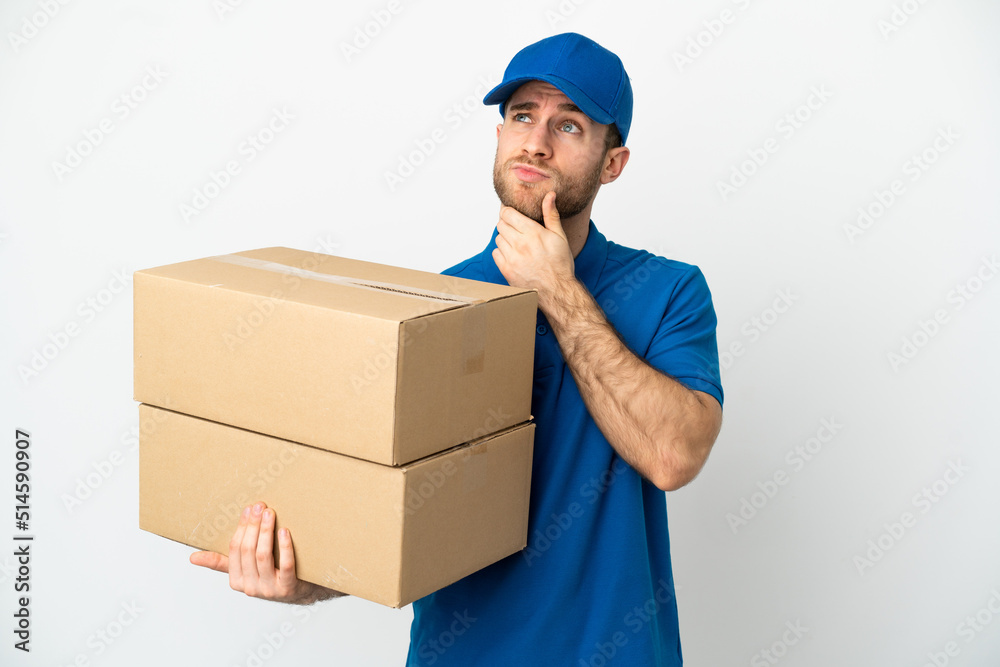 Delivery man over isolated white background having doubts Delivery man over isolated white background having doubts