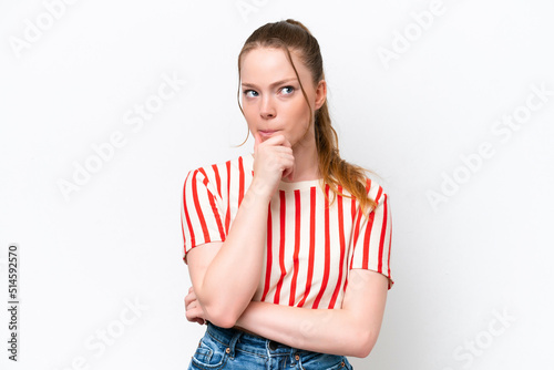 Young caucasian girl isolated on white background having doubts and thinking