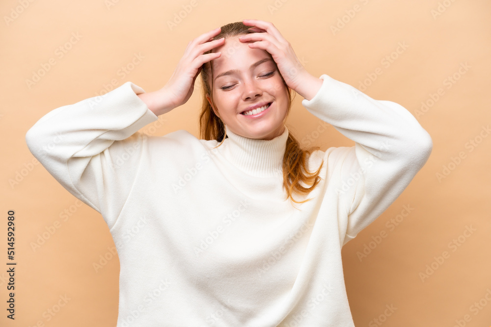 Young caucasian woman isolated on beige background laughing Young caucasian woman isolated on beige background laughing
