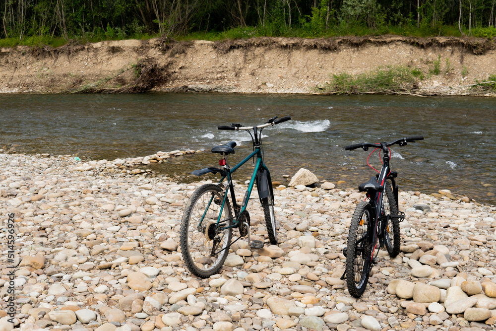 Fototapeta premium bicycles on the river bank