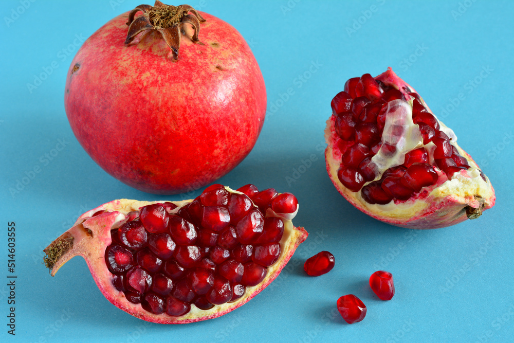 pomegranate fruit with red seeds isolated, close-up pomegranate fruit with red seeds isolated, close-up