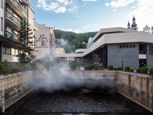 Fototapeta Karlovy Vary, Bohemia, Czech Republic - May 27 2022: Tepla River and Hot Springs colonnade or Vridelni Kolonada in Carlsbad