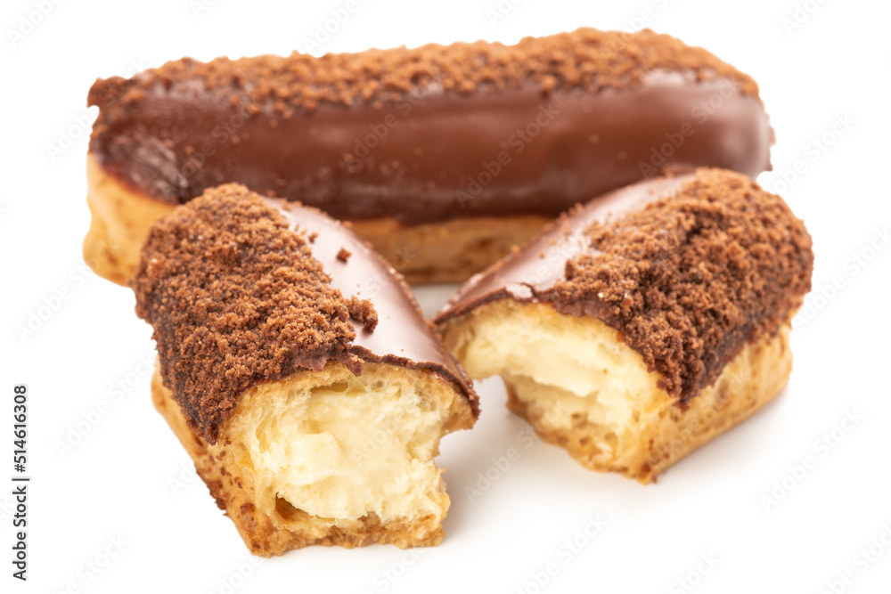 eclairs with filled vanilla butter cream and covered with chocolate isolated on white background eclairs with filled vanilla butter cream and covered with chocolate isolated on white background