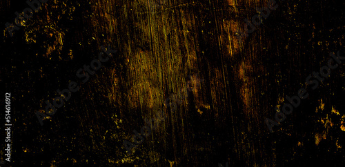 Yellow abstract concrete wall on structured dark background color.