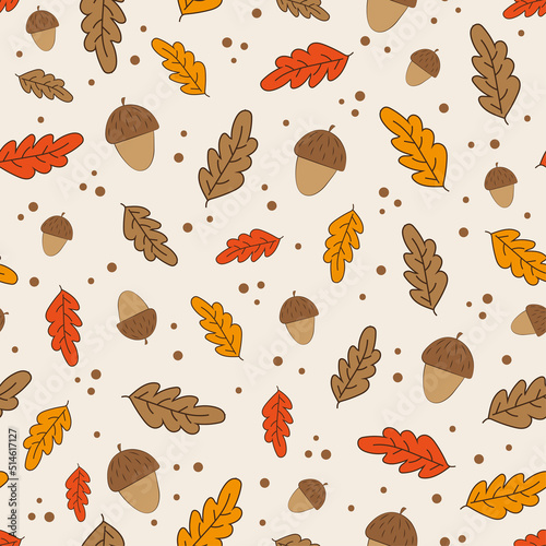Autumn leaves seamless pattern. Hand drawn oak leaf and acorn on beige color backgound.