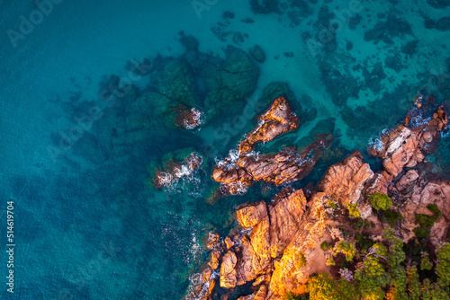 Aerial view over rocks landscape and blue turquoise sea at Costa Brava, Catalonia, Spain.