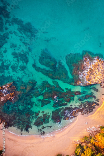 Aerial view of Sa Conca beach  Costa Brava  Catalunya  Mediterranean sea coast  Spain. Background of a paradisiacal beach with transparent turquoise blue water. Summer tourism. Beach vacations.