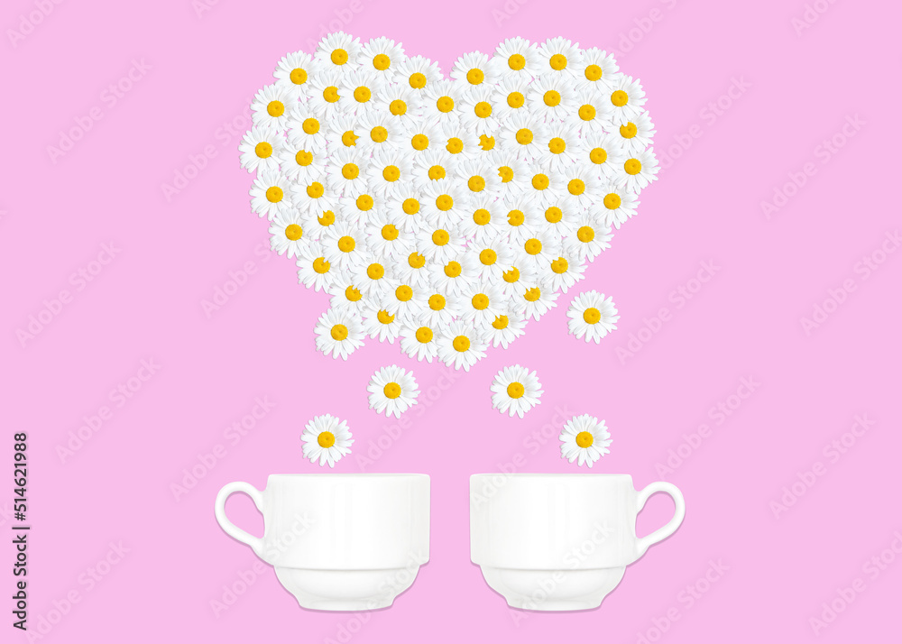 Two tea cups with a daisies heart above on pink Two tea cups with a daisies heart above on pink