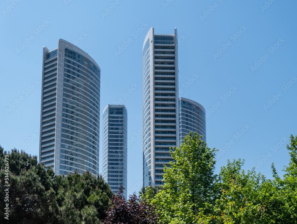 Skyscrapers in city Istanbul against blue sky