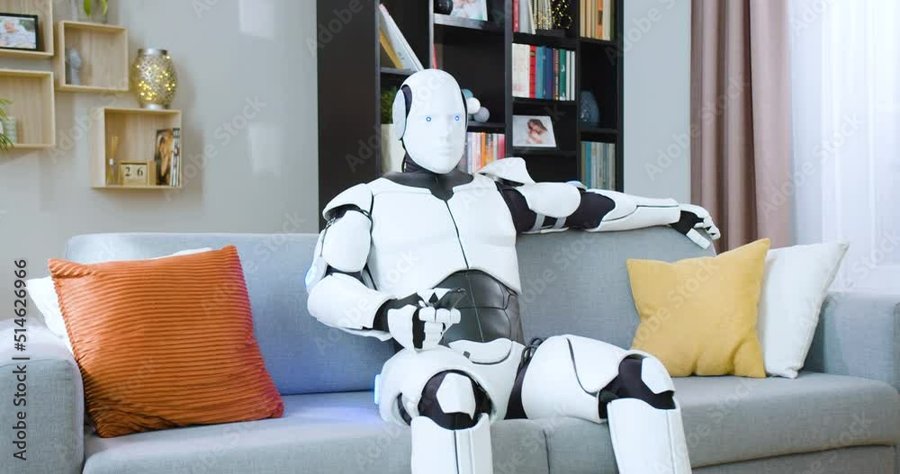 Robot Rested Human Human like robot enjoying weekends while resting on comfy sofa in ...