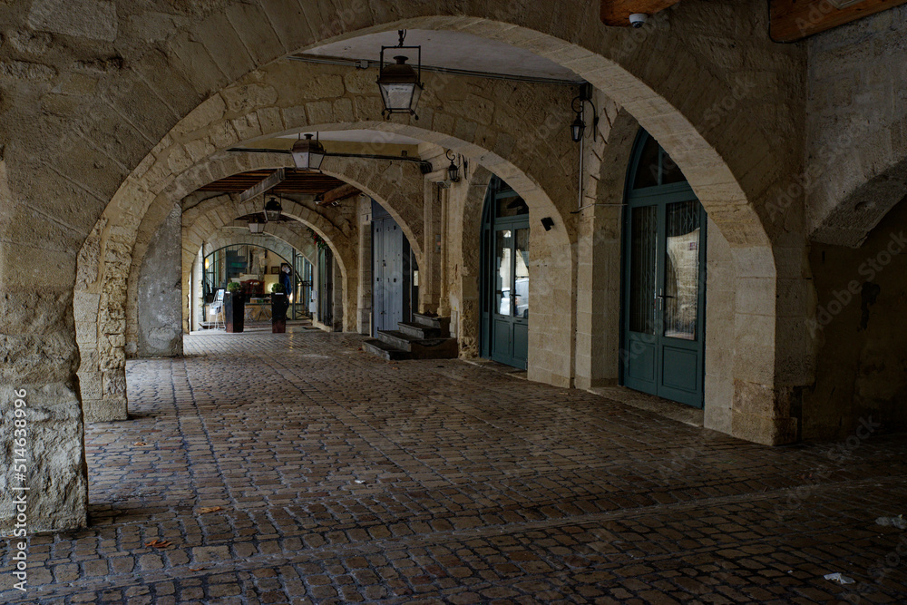 Medieval covered galleries of the Place aux Herbes in Uzes