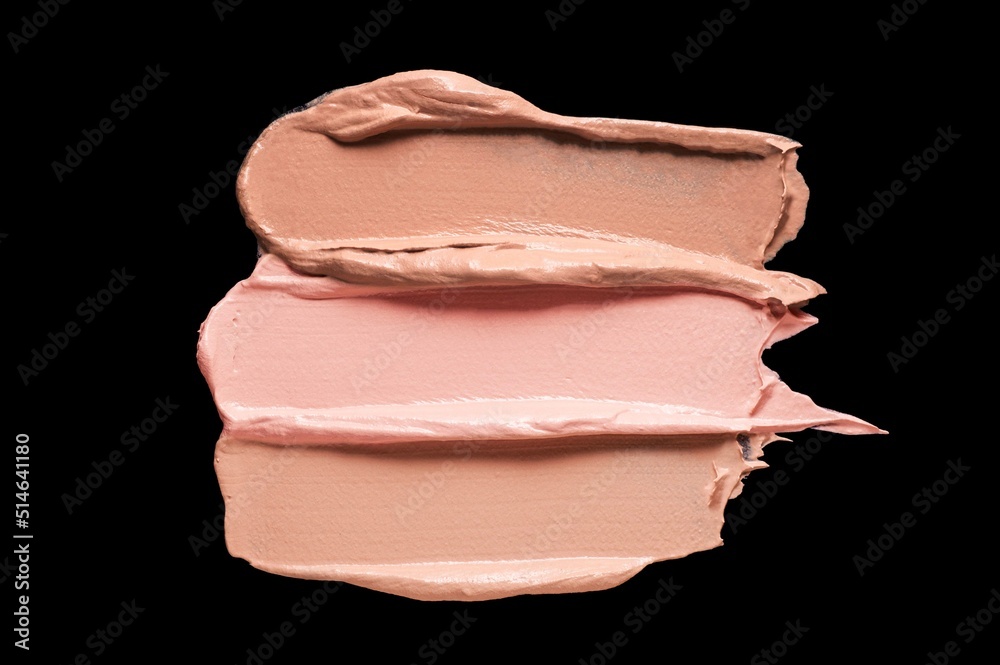 Texture of smudge 3 color tones cosmetic bb or cc cream foundation liquid background isolated on black Texture of smudge 3 color tones cosmetic bb or cc cream foundation liquid background isolated on black