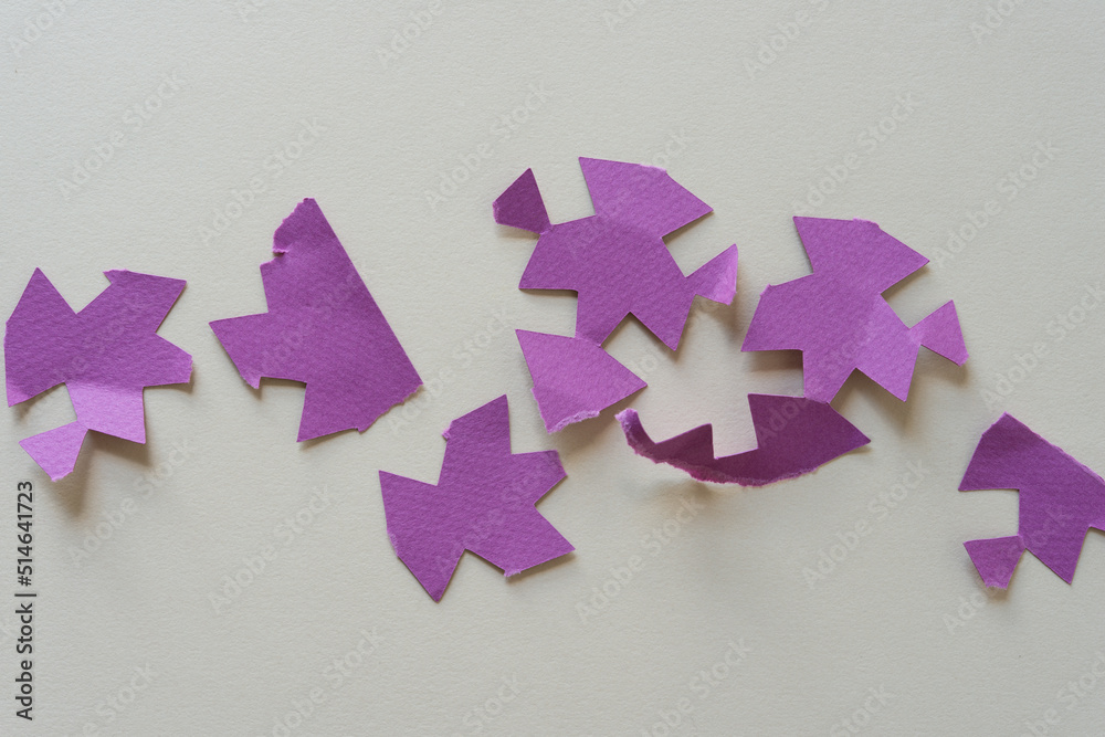 purple paper shapes on gray background purple paper shapes on gray background