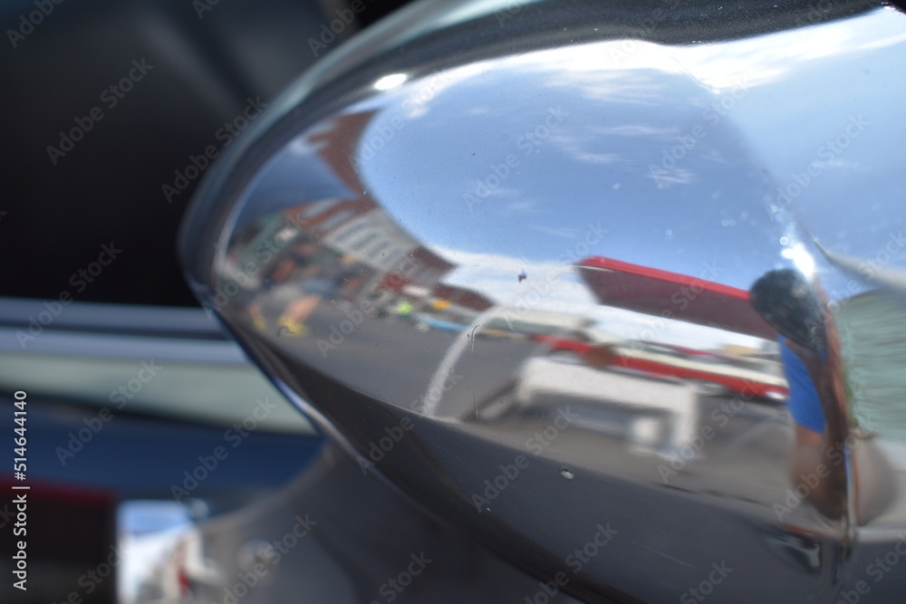 Obraz premium Reflection in the Chrome of a Car Mirror