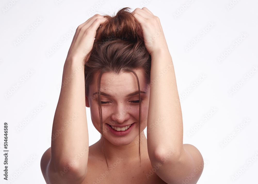 Young woman problem skin. Acne, pimple, clear and clean, oily, dry skin concept. Cose up of worried young lady touching her face gently on white background Young woman problem skin. Acne, pimple, clear and clean, oily, dry skin concept. Cose up of worried young lady touching her face gently on white background