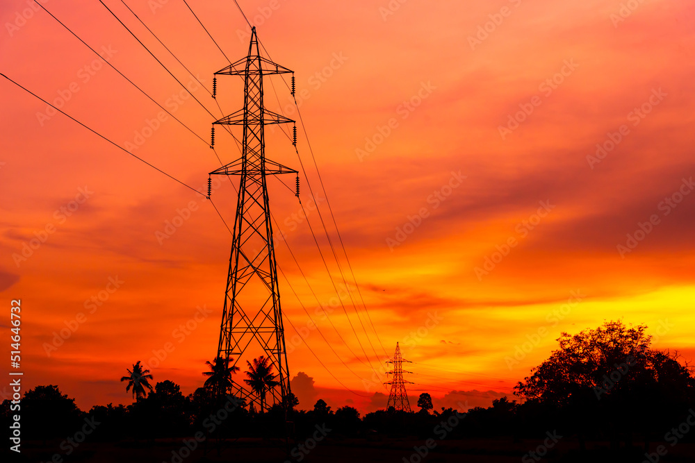 electric pole on sunset background, Sunset over the electric power lines. clean energy. High voltage electric tower . with shadow. electric pole on sunset background, Sunset over the electric power lines. clean energy. High voltage electric tower . with shadow.