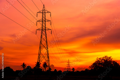 electric pole on sunset background, Sunset over the electric power lines. clean energy. High voltage electric tower . with shadow.