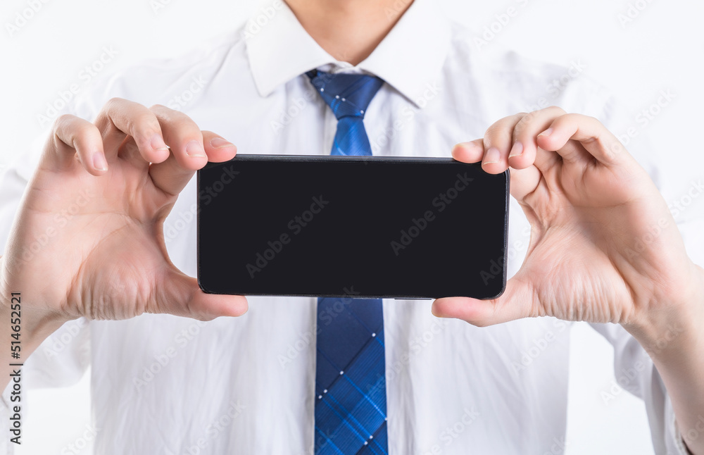 Men in formal suits play with their phones with their hands Men in formal suits play with their phones with their hands