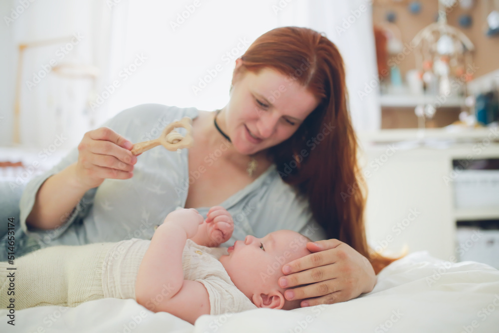 Plus size mom play with chubby baby 6 months in woolen eco diapers,