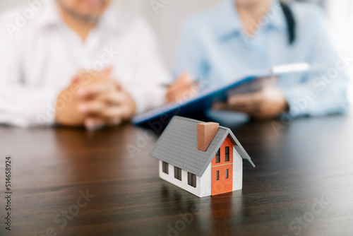 Real estate brokers or real estate agent with client or architect team Discussions about contracts , Saving money to invest in house or property in the future. Business property Concept.