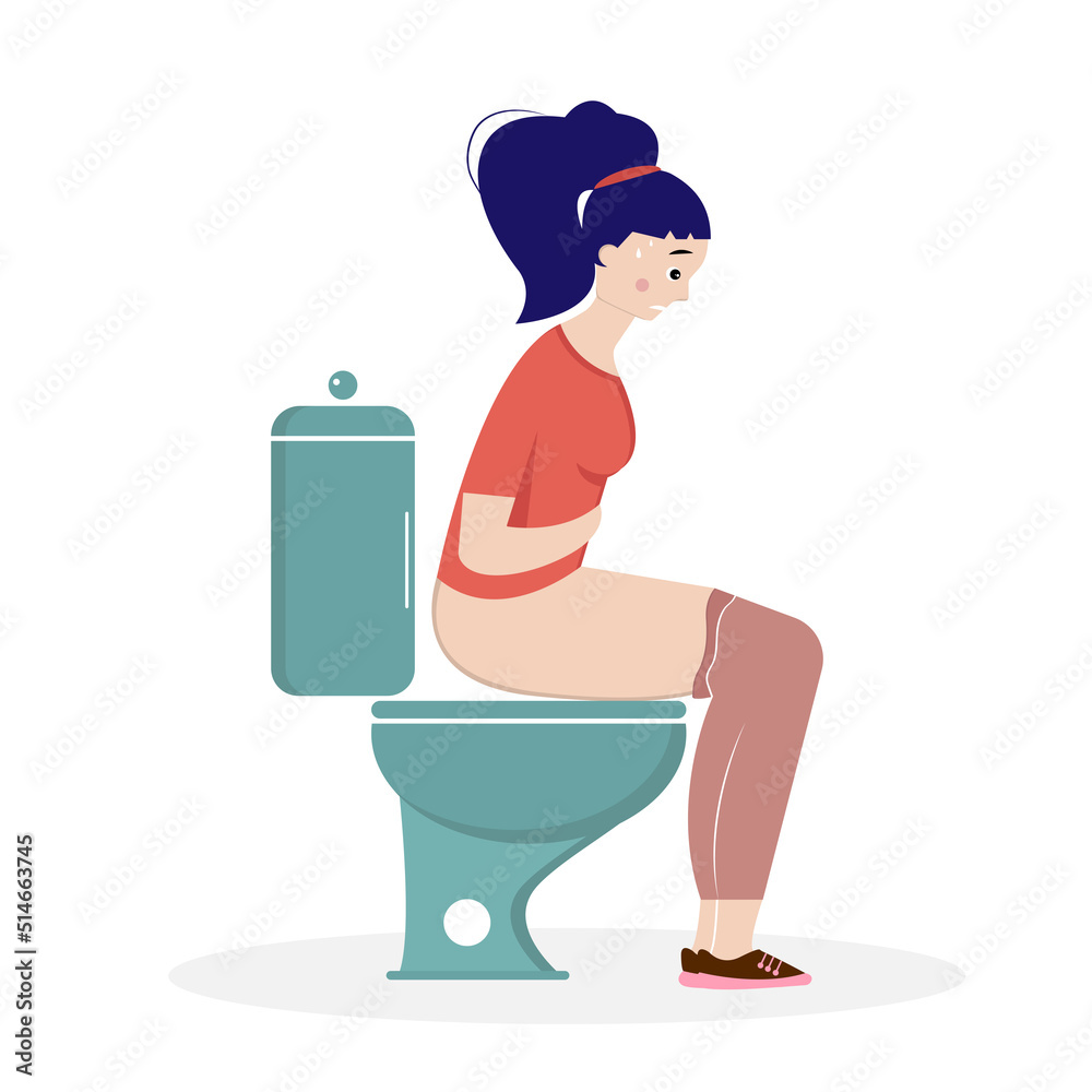 A woman is sitting on the toilet. Constipation. A woman is sitting on the toilet. Constipation.