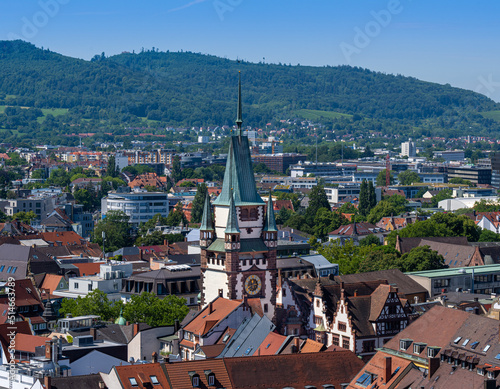 View from Freiburg Minster tower (Cathedral of Our Lady) over Freiburg to old Martin Gate tower. Baden Wuerttemberg, Germany, Europe