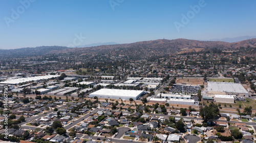 Day time aerial view of the industrial warehousing and residential areas of Brea, California, USA, a city in North Orange County.