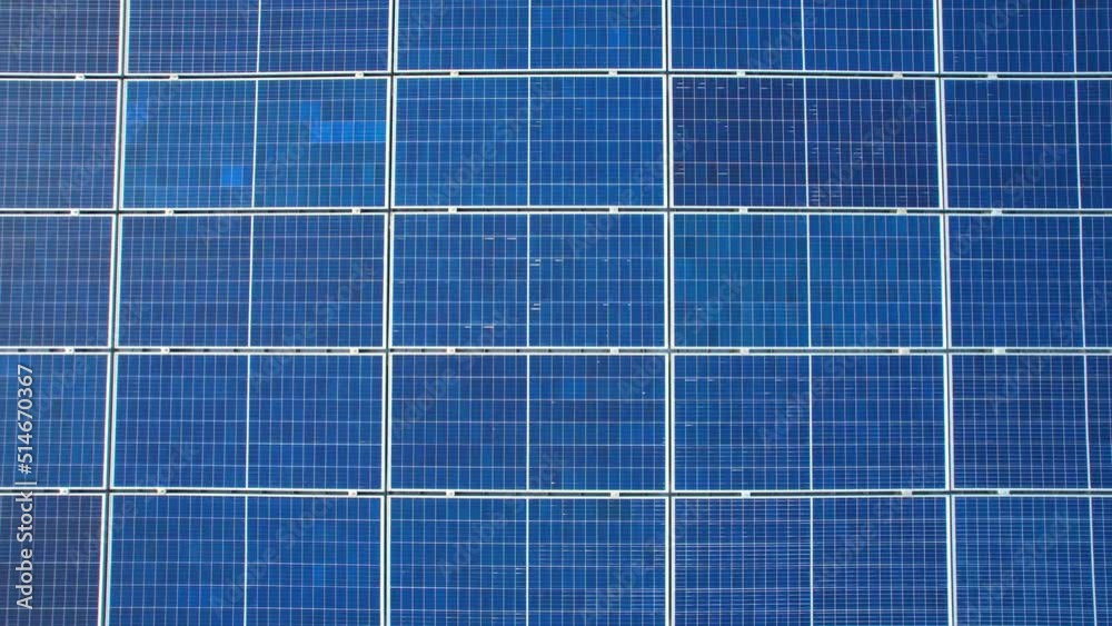 Drone flying over photovoltaic solar panels mounted on building roof. Production of renewable energy concept. Clean energy industry in Nonthaburi, Thailand. drone footage. 4k
Drone flying over photovoltaic solar panels mounted on building roof. Production of renewable energy concept. Clean energy industry in Nonthaburi, Thailand. drone footage. 4k