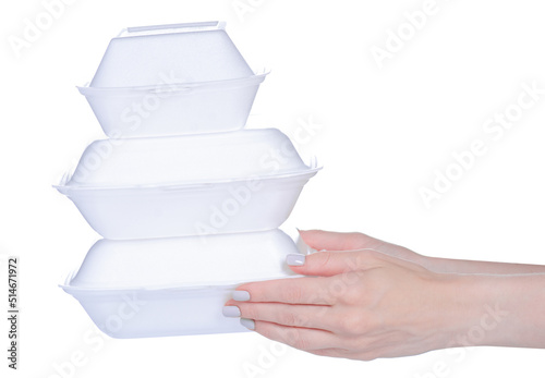 White containers food in hand on white background isolation