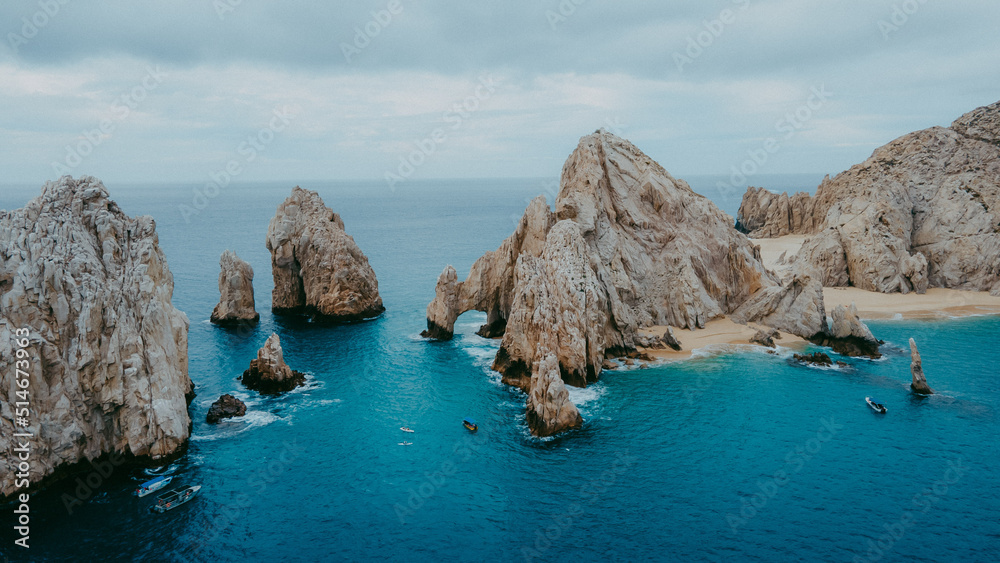 Los Arcos on a cloudy day in Cabo, San Lucas. Los Arcos on a cloudy day in Cabo, San Lucas.