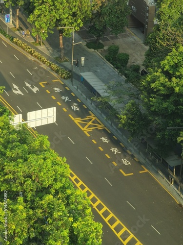 sunset moment on a main road in central downtown district of shenzhen china photo