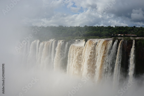 The photo shows a stunning view from the top of the Iguazu Falls     a complex of 275 waterfalls on the Iguazu River  located on the border of Brazil and Argentina