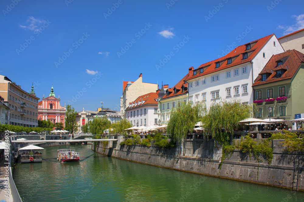 Panorama of river Ljubljanica and colorful buildings in Ljubljana, Slovenia