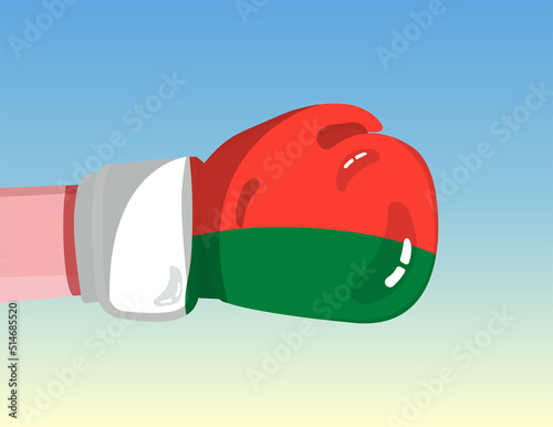 Flag of Madagascar on boxing glove. Confrontation between countries with competitive power. Offensive attitude. Separation of power. Template ready design.