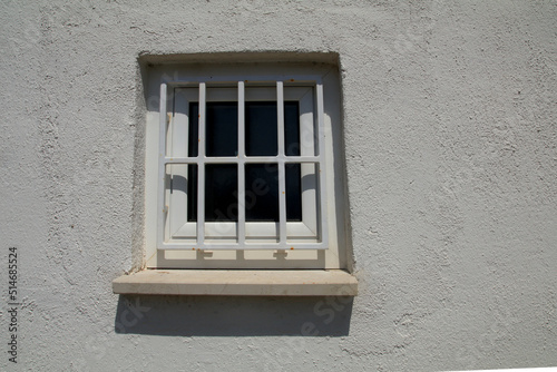 Bars on the windows like in a prison photo