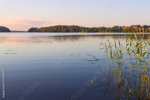 Warm summer windless evening on Finnish lake Tuusula. photo