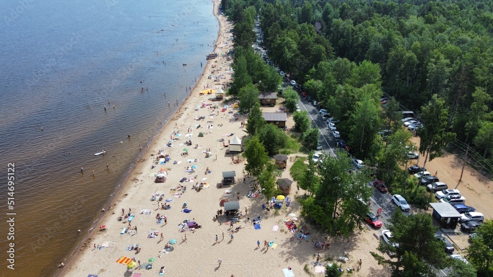 Drone photo of people resting on beach