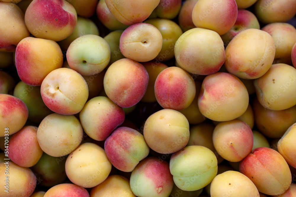 Peaches on a market background Peaches on a market background